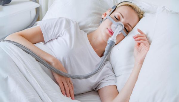 Woman wearing a BMC Nasal CPAP Mask | CPAP.co.uk